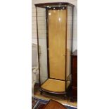 A 1920's mahogany bowfront shop display cabinet H.204cm