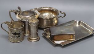 A heavy silver trinket dish, 13cm, two George V drum mustards, a tea strainer and stand, a