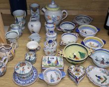 A large collection of Quimper pottery