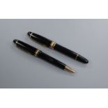 A Montblanc Meisterstuck fountain pen and ballpoint pen set fountain 14.5cm, ballpoint 14.75cm.