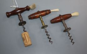 Three 19th century English Henshall type button wood handled corkscrews, one with brass shaft and