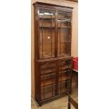 An early 19th century mahogany glazed bookcase (glass a.f.) W.96cm