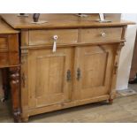 A 19th century European pine low cupboard W.98cm