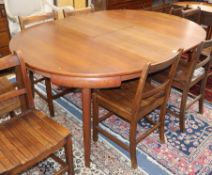 A Danish extending teak dining table L.170cm extended