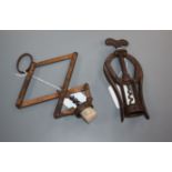 A Heeley's Original Patent 'Pullezi' corkscrew and a James Heeley A1 patent double lever corkscrew