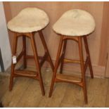 A pair of Erik Buch teak counter stools