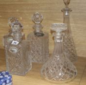 Three cut glass decanters and two others