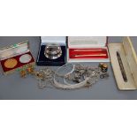 A cased silver paperweight, a gold bar brooch and sundry costume jewellery, etc.