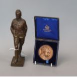 An Elkington & Co. medal and Kimberley military figure