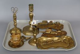 A group of 18th century Georgian brass lighting accessories including a candlestick, wax jack (
