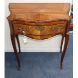 An 18th century French transitional period amaranth banded serpentine fronted side table W.64cm