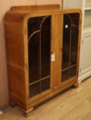 A 1950's Deco style display cabinet W.107cm