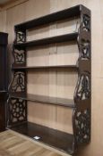 A set of George III mahogany shelves W.69cm
