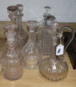 Six decanters and a ewer