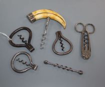 Six 19th century corkscrews, including a peg and worm, three steel folding bows, one with a hippo