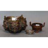 A Chinese bronze tripod censer, a hanging five mask censer and sycee type ingot (3)