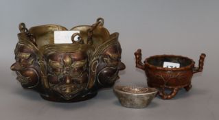 A Chinese bronze tripod censer, a hanging five mask censer and sycee type ingot (3)