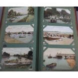 Two albums of Edwardian and later postcards, including views of Brighton and Victorian photo album