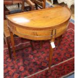 An early 19th century Dutch chequer inlaid mahogany 'D' shaped side table W.80cm