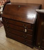 A George III oak bureau W.98cm