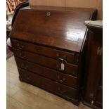 A George III oak bureau W.98cm