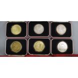 The Royal Family Cameo Collection by John Pinches (six silver portrait ingots), an 1890 crown and