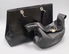 A Cartier Panthere black leather tote with silver-toned hardware (serial No. L1000361) and a Cartier