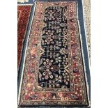 A Meshed rug 220 x 98cm