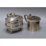 A George III silver drum mustard of oblong form, London 1812 and a George V silver circular drum