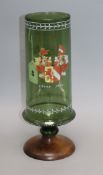 A German Historismus green glass vase with enamelled armorial, later base