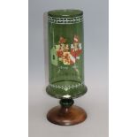 A German Historismus green glass vase with enamelled armorial, later base