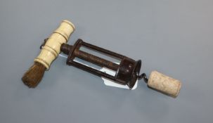 A 19th century English steel two pillar corkscrew, fine threaded shaft, wire helix, with turned bone