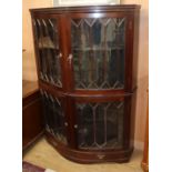 A 1920's mahogany bowfront display cabinet W.125cm