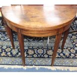 A George III demi lune mahogany tea table W.88cm