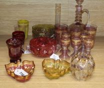 A collection of decorative glassware, including a gilded pale amethyst part liqueur set, three