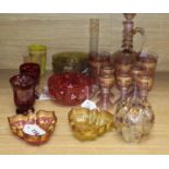 A collection of decorative glassware, including a gilded pale amethyst part liqueur set, three