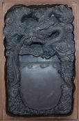 A dragon carved ink stone (boxed) stone length 37cm
