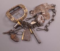 An early 19th century steel and marcasite chatelaine with tools, a similar large buckle and a