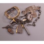 An early 19th century steel and marcasite chatelaine with tools, a similar large buckle and a