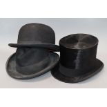 A top hat by Herbert Johnson, a bowler hat, a trilby and a collection of stiff collars
