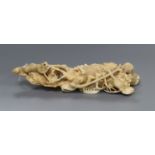 A Japanese ivory okimono of rats crawling over a lobster, early 20th century, unsigned 14.5cm