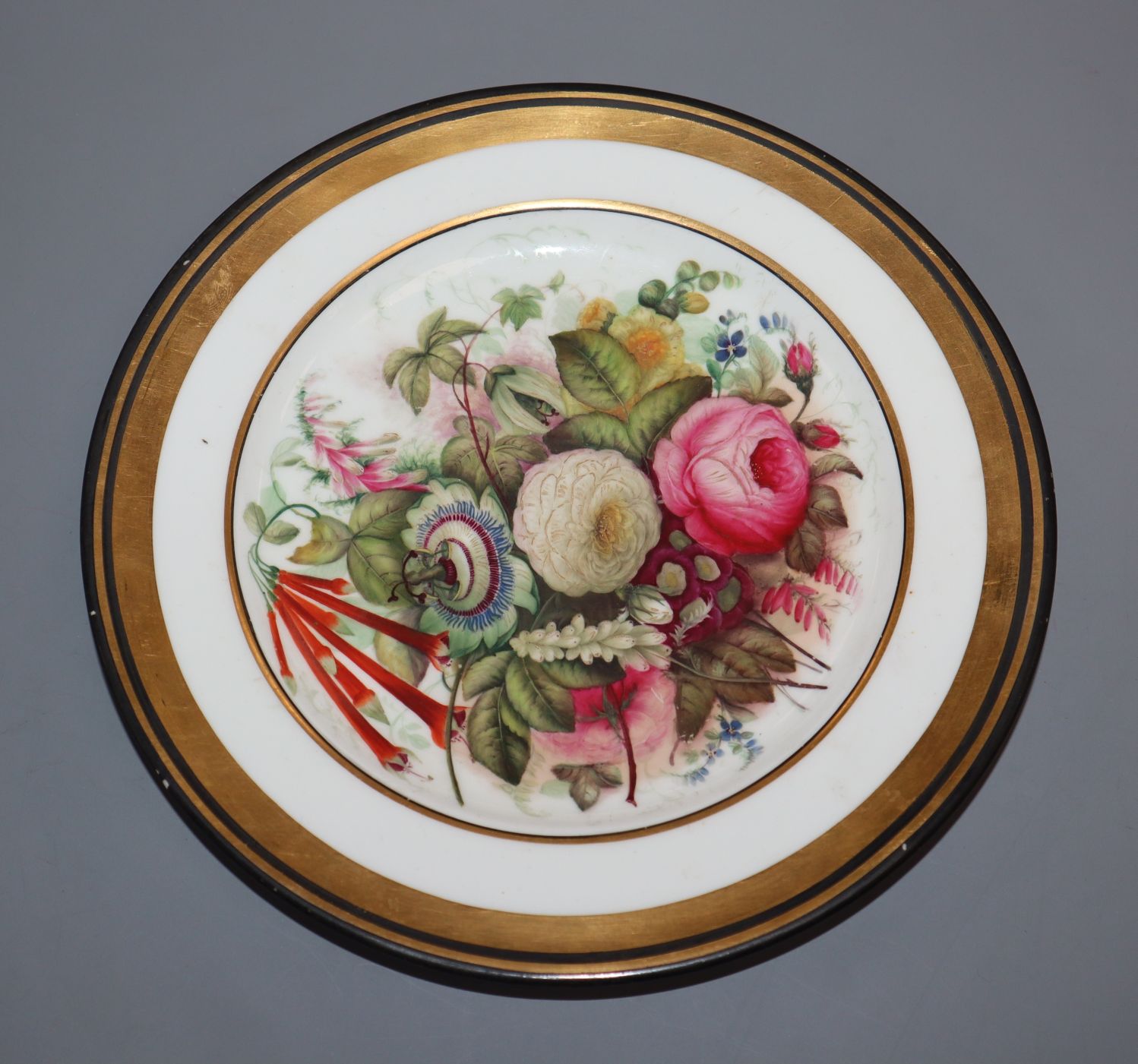 A rare documentary English porcelain apprentice plate inscribed 'August 23 / 44 John Griffiths 5th