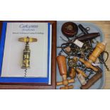 A collection of 19th/20th century corkscrews and two reference books, including finger pull, simple,