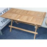 A teak drinks table W.100cm