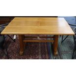 An Art Deco 1920's oak extending dining table L.137cm