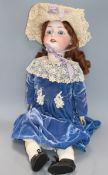 A large Heubach Koppelsdorf 350-11 bisque headed doll, open mounted and dimpled chin