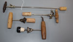 Two American champagne or soda taps and two 'bell cap' corkscrews, (4)