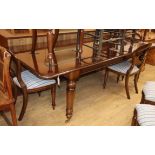 A Victorian style mahogany dining table L.238cm with leaf in