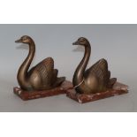 M Leducq. A pair of spelter swan bookends, on marble base height 17cm