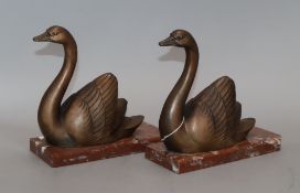 M Leducq. A pair of spelter swan bookends, on marble base height 17cm